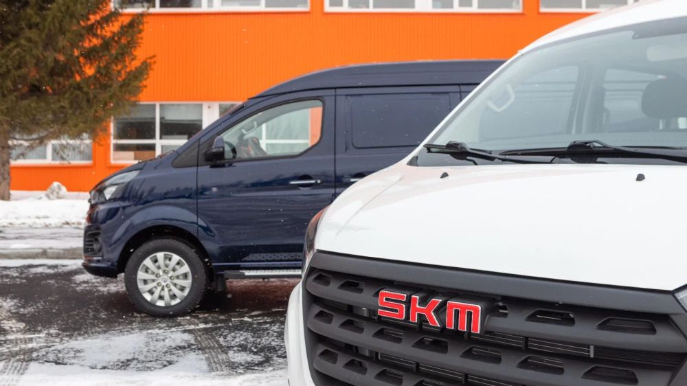 ǻ        SKM