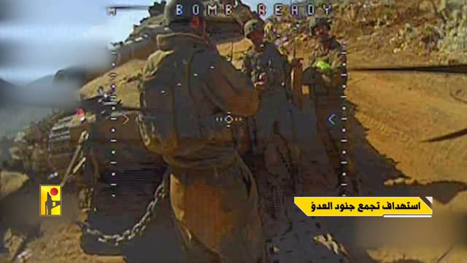Прилет FPV-дрона "Хезболлы" прямо в израильского солдата, стоявшего перед танком Merkava Mk.4M Прилет FPV-дрона "Хезболлы" прямо в израильского солдата, стоявшего перед танком Merkava Mk.4M