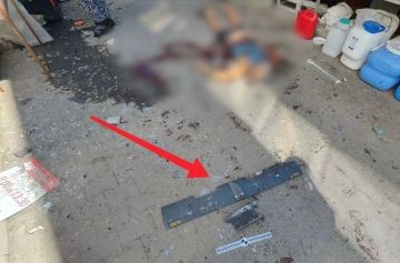 Ужасающие кадры 18+ с места удара по рынку в Токмаке